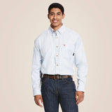 Ariat FR Twill DuraStretch Work Shirt worn by a man, featuring a blue checked design and button-up style.