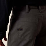 Close-up of the back pocket of Ariat Rebar M4 Low Rise DuraStretch pants showcasing the logo.