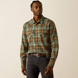 A model wearing the Ariat Mens Henry Retro Fit Shirt, featuring a stylish plaid design in earthy tones.