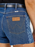 Wrangler Women's embellished cowboy cut-off shorts showcasing stylish back pocket and floral detailing.
