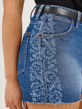 Side view of Wrangler Women's Embellished Cowboy Cut-Off Shorts featuring a stylish design and super high rise.