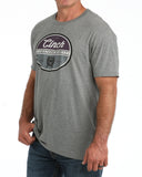 Cinch Men's gray logo short sleeve T-shirt worn casually, showcasing the classic Cinch logo design.