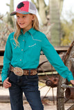 Cruel Girls Long Sleeve Western Solid Shirt in Teal worn by a girl with a hat and belt in a rustic setting