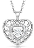 Waves of Love Heart necklace featuring intricate silver design and a sparkling center stone, perfect for expressing love.