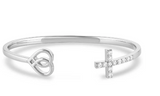 Love and Faith Cuff Bracelet featuring a heart and cross design in silver tone.
