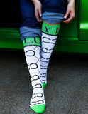 Lucky Chuck High Maintenance Cowgirl Kelly Green Boot Socks worn by a person with rolled-up jeans.