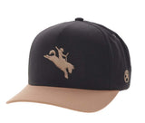 Hooey "Whit" hat in black and tan with curved bill and high-profile design, featuring a rodeo rider logo.