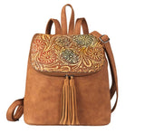 Nocona Women's Mae Floral Embossed Brown Western Backpack with tassel zipper pulls and colorful floral design.