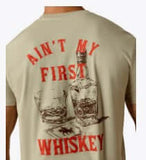 Ariat Men's Whiskey Uno Classic Fit T-Shirt featuring a bold graphic with the text 'AIN'T MY FIRST WHISKEY' and whiskey imagery.