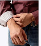 Close-up of a man adjusting the cuff of an Ariat Men's Wrinkle Free Dion Classic Fit Long Sleeve Snap Shirt.