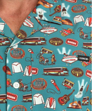 Cinch Men's NFR Teal Print Short Sleeve Camp Shirt featuring vibrant Las Vegas and rodeo-themed graphics.