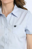 Cinch Women's Arenaflex light blue short sleeve shirt with embroidered logo on pocket.