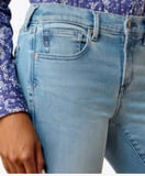 Ariat Women's Perfect Rise Revel Ultrastretch Boot Cut Jeans in Vilma, showcasing a close-up of the denim fabric and waistband.