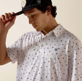 Ariat Men's White Western Toss Print Polo, stylish and comfortable performance shirt.