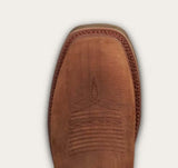 Close-up of the Tecovas LongHaul work boot's square toe, showcasing premium leather and detailed stitching.
