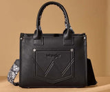 Wrangler Women's black handbag with paisley strap and stylish design for everyday use.