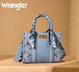 Wrangler Women's Paisley Print Tote Crossbody Bag in Desert Jean Paisley with embroidered details and signature logo.
