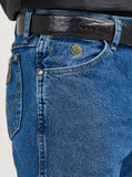 Close-up of Wrangler Men's George Strait Cowboy Cut original fit jeans displaying classic denim style and stitching details.