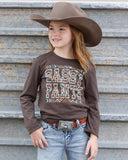 Girl wearing Cruel Girl Sassy Pants Graphic Shirt and a cowboy hat, showing fun western style.