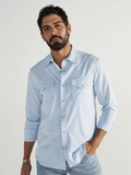 TECOVAS Men's Performance Western Pearl Snap Long Sleeve Shirt in Sky color, featuring twin front pockets.