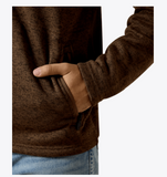 Ariat Men's Caldwell 1/4 Zip in Carafe showcasing hand in pocket and fabric texture.
