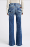 Back view of 7 For All Mankind Dojo Tailorless Flare Jeans in mid wash, showcasing wide-leg design and stylish pockets.