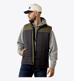 Ariat Men's Crius Insulated Vest in Phantom/Grape Leaf worn by a model, showcasing its lightweight warmth and sleeveless design.