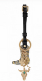 Wrangler Western cowhide cowboy boot bag charm featuring a turquoise bull and gold accents on a keychain.