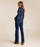 Model showcasing Seven For All Mankind DOJO 36" Slim Illusion Medium Melrose jeans from the back view.