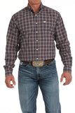 Cinch Men's Plaid Button-Down Western Shirt in purple worn with blue jeans and a stylish belt