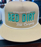 Red Dirt Hat Co. khaki/mint mesh flatbill cap with embroidered logo and established year.
