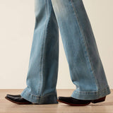 Ariat Women's High Rise Marnie Slim Trouser Jean in light wash, styled with black western boots.