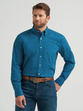 Wrangler Men's Cody Johnson One Pocket Button Down Shirt worn by a man, showcasing blue patterned fabric with a button-down collar.