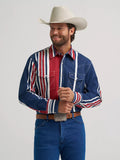 Man smiling in Wrangler® Brushpopper Western Snap Shirt in Americana red, white, and blue with cowboy hat.