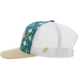 Hooey Doc Hat in teal and white Aztec design with rectangle patch, showcasing a stylish 5-panel snapback.