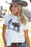Woman wearing a Cruel Girl® women's crop t-shirt with a graphic of a horse and rider, showcasing a western style.