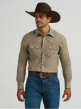 Wrangler Cody Johnson Western Snap Shirt in olive color, featuring long sleeves and two front pockets, modeled by a man.