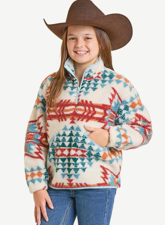 Girls' Aztec Sherpa Pullover with vibrant print, cozy sherpa fabric, and stylish look on a child wearing a hat.