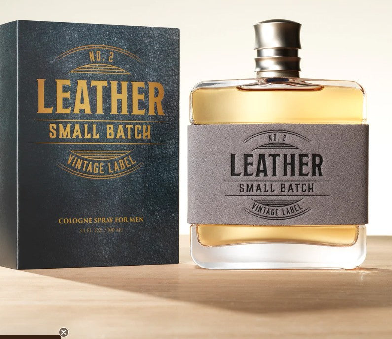 Leather Small Batch Vintage Label Cologne displayed in a stylish bottle with matching box, emphasizing its masculine allure.