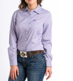 Cinch ladies purple pinstripe western shirt displayed on model, featuring white logo buttons and chest pocket.