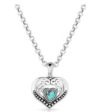 silver heart necklace featuring a turquoise pendant with intricate design and a delicate chain.