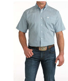Cinch Men's Blue Geometric Print Short Sleeve Shirt in Classic Fit worn with jeans and a belt.