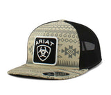 Ariat Men's Flexfit 110 tan Aztec snapback cap with black patch logo on a striking southwestern patterned background.