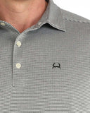 Cinch Men's ArenaFlex Polo in blue yarn-dye featuring cream buttons and subtle Cinch logo on the chest.