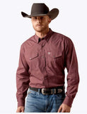 Ariat Men's Wrinkle Free Dion Classic Fit Long Sleeve Snap Shirt model wearing a cowboy hat and jeans.