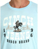 Cinch Men's Short Sleeve Tee featuring cowboy on horse graphic in light blue color