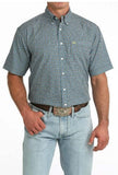 Cinch Men's Short Sleeve Print Arenaflex Shirt in blue pattern with jeans, perfect for western lifestyle and performance.