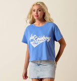 Ariat Women's Cowboy Club Cropped Graphic T-Shirt in blue with chenille embroidery detail, styled with denim skirt.