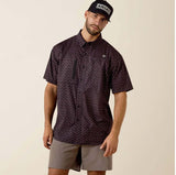 Ariat Men's Printed VentTEK Classic Fit Western Shirt in black pattern, model wearing shirt with cap.