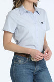 Cinch Women's Arenaflex light blue short sleeve performance western shirt with classic collar, perfect for stylish cowgirls.
